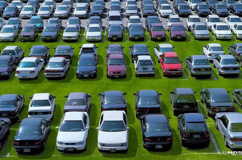 NDS EZ Roll Grass Pavers with Cars Parked Lot
