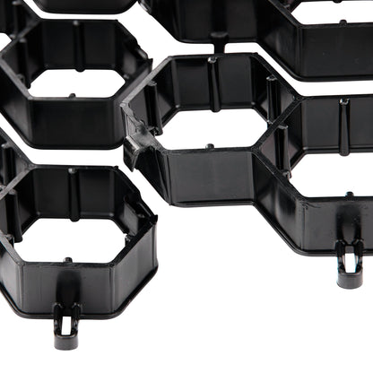 Close-up of NDS EZ Roll grass paver hexagonal cells and locking clips